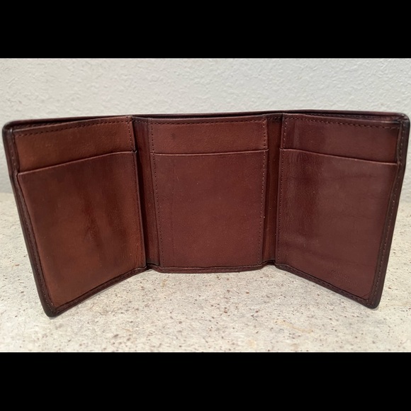 Other - Dark brown trifold leather wallet. Slim compact design. Luxury supple leather.